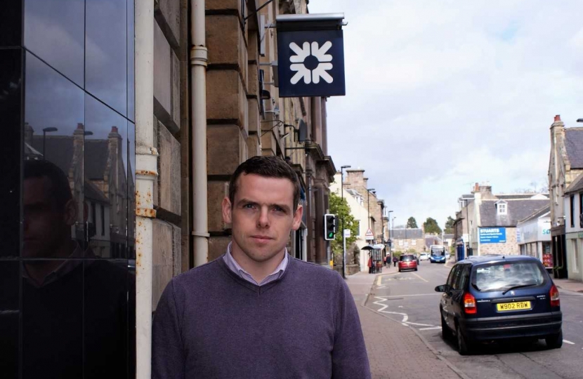 Moray MP Douglas Ross outside the now closed Forres RBS branch