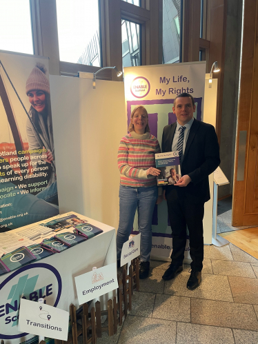 Douglas is pictured in the Scottish Parliament with Heather Gilchrist from ENABLE